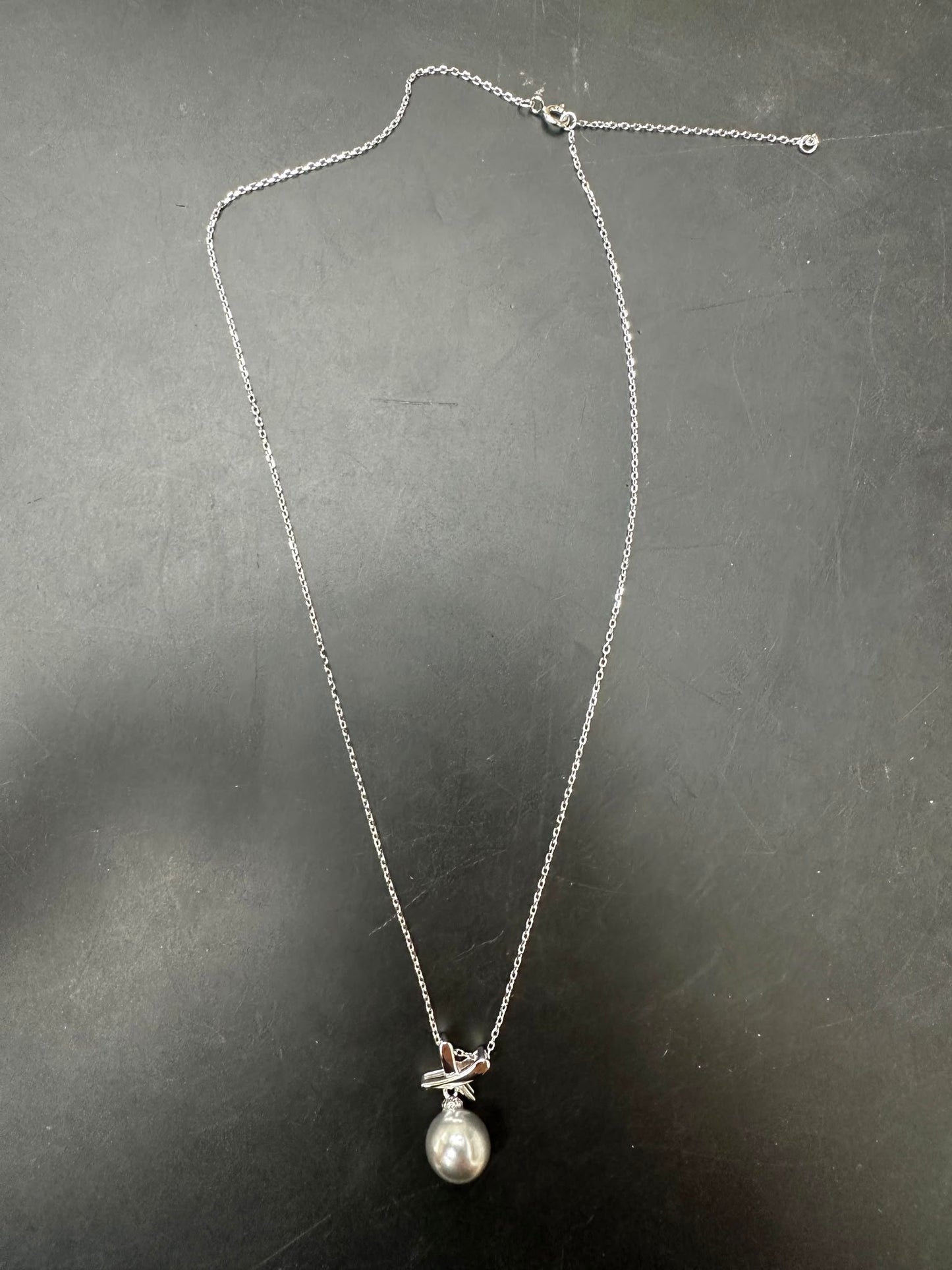 Sterling silver pearl necklace NP154 featuring a 10MM pearl pendant on a sleek chain.