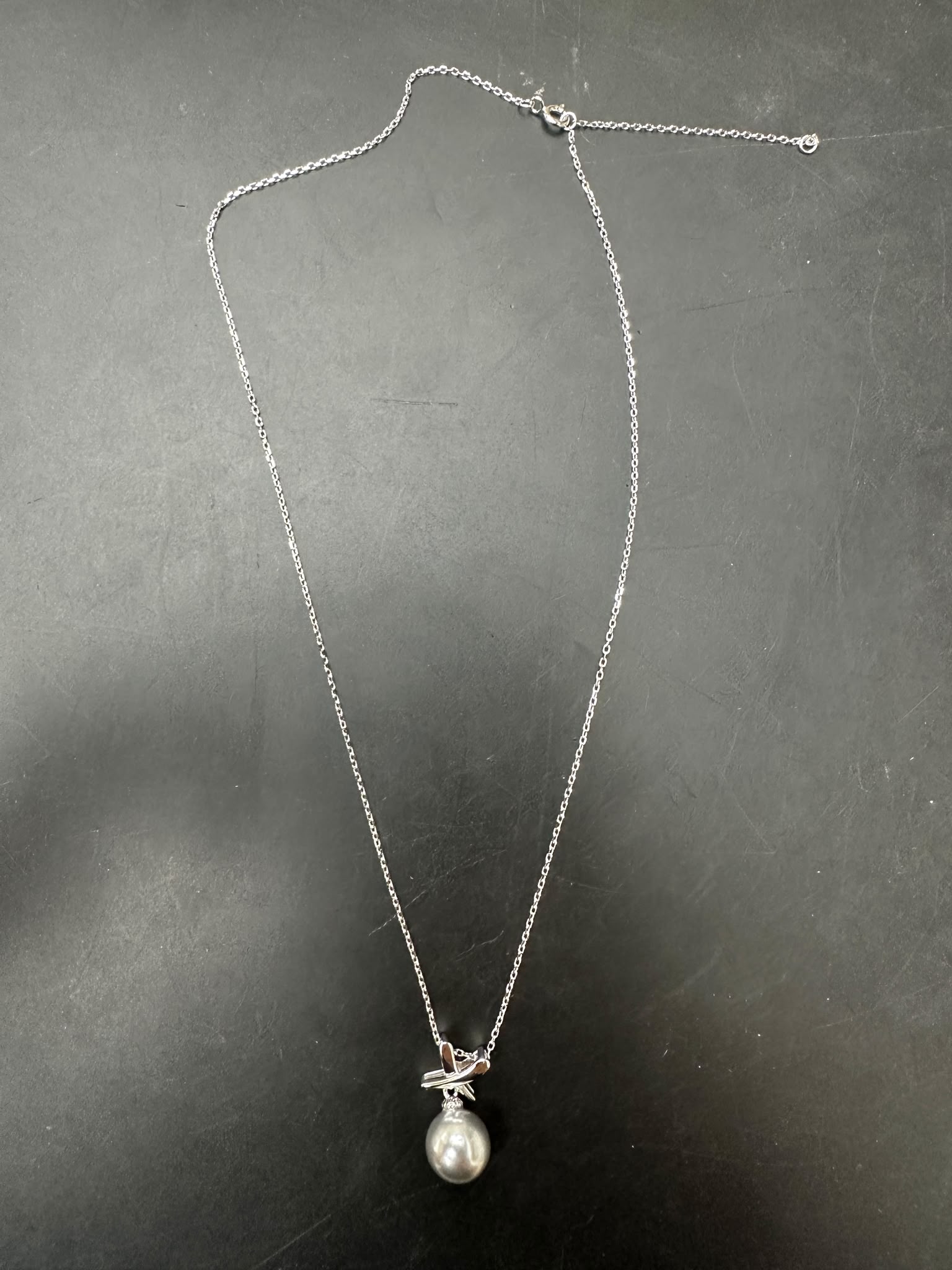 Sterling silver pearl necklace NP154 featuring a 10MM pearl pendant on a sleek chain.
