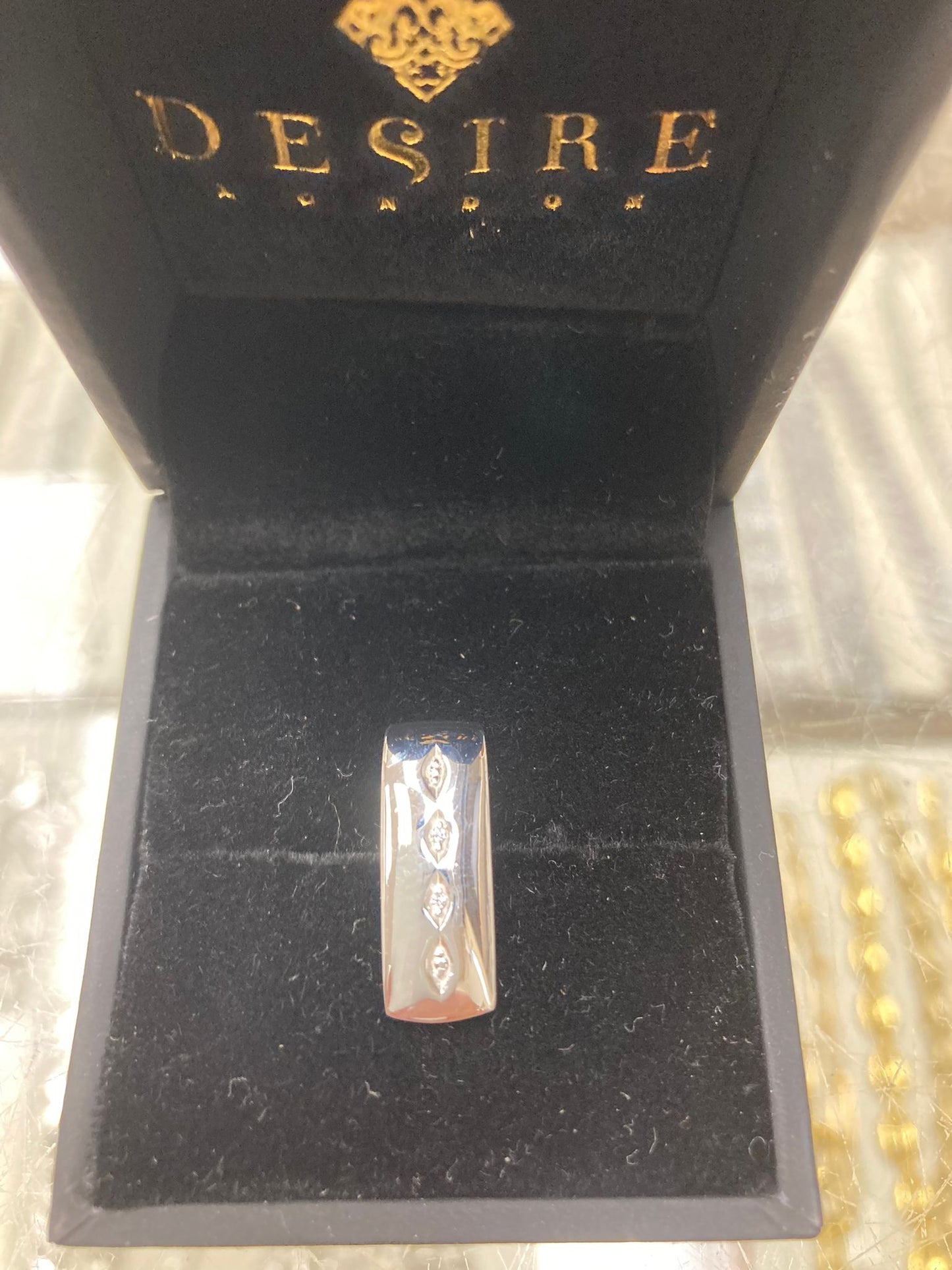 Sterling silver cz pendant PCZ009 showcased in a velvet-lined box.