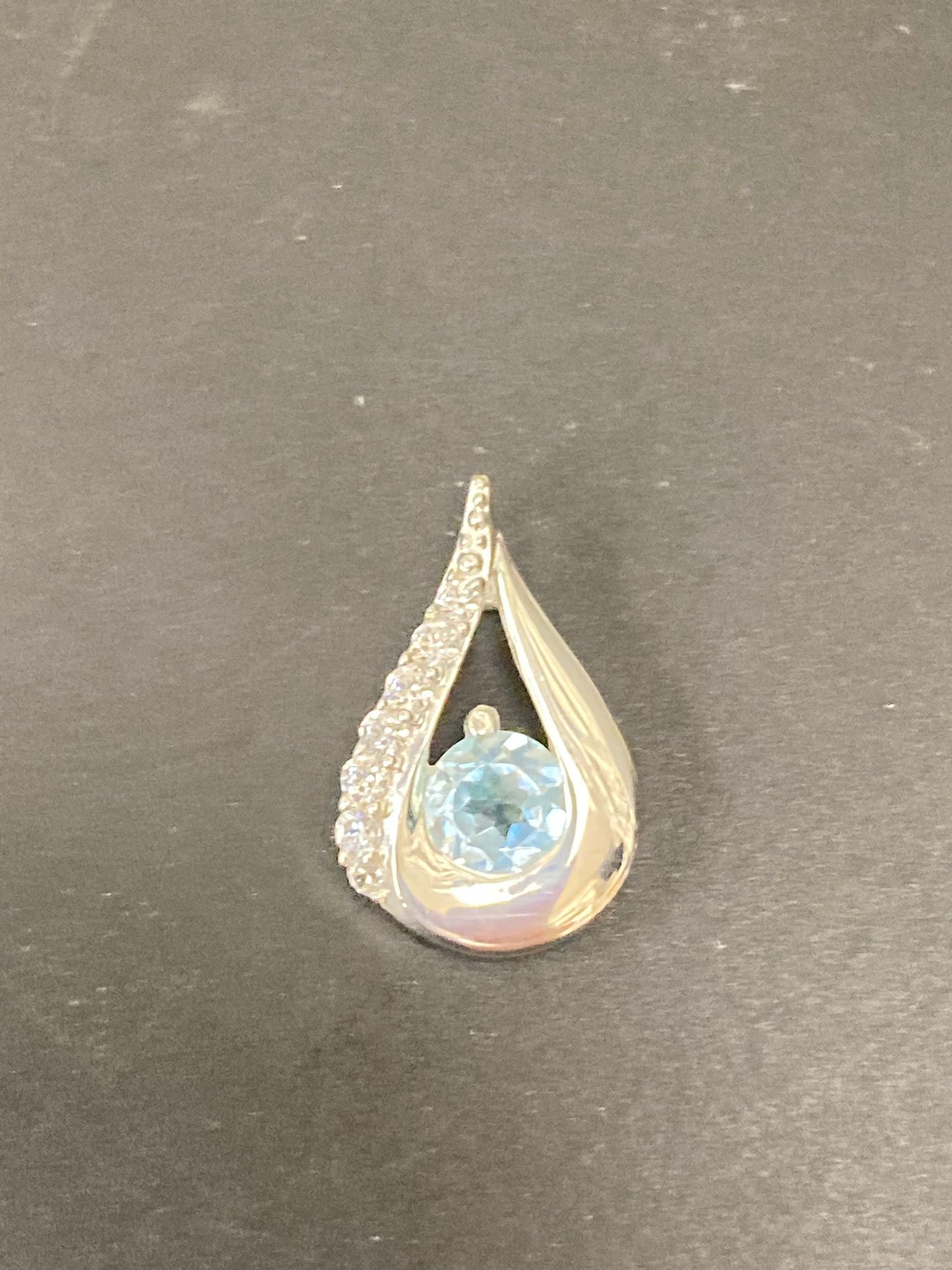 Sterling Silver Cz Pendant PCZ012 featuring a blue gemstone in a teardrop design.