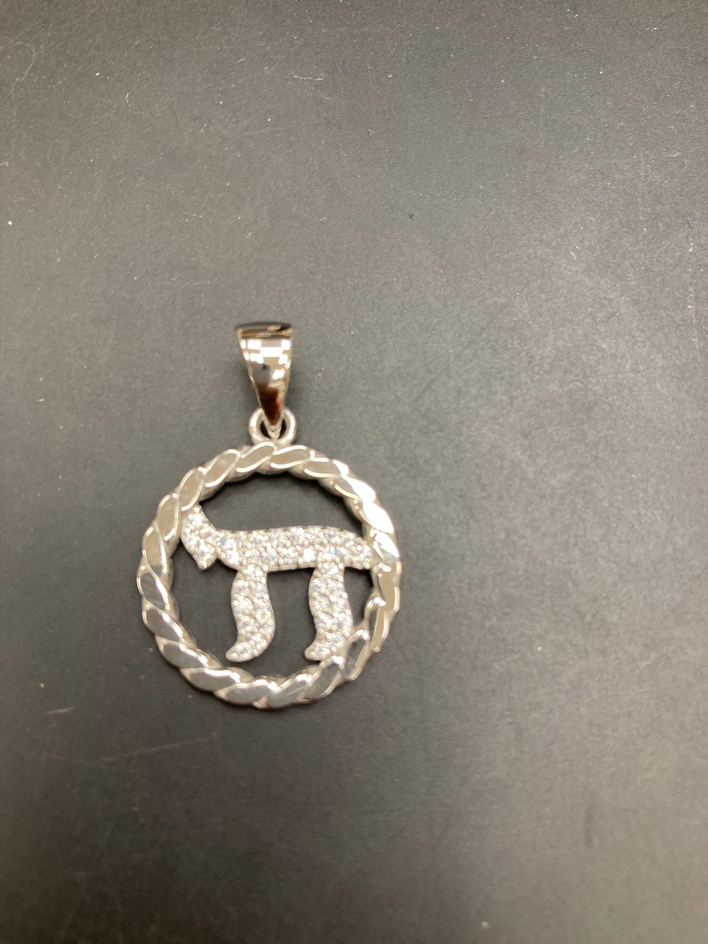 Sterling Silver Cz Hebrew Chai Pendant PCZ014 featuring a sparkling chai symbol design.