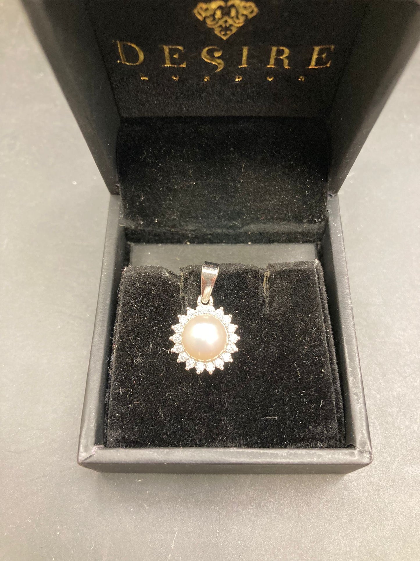 Sterling Silver Cz Pearl Pendant PCZ1302 displayed in a luxury box with velvet lining.