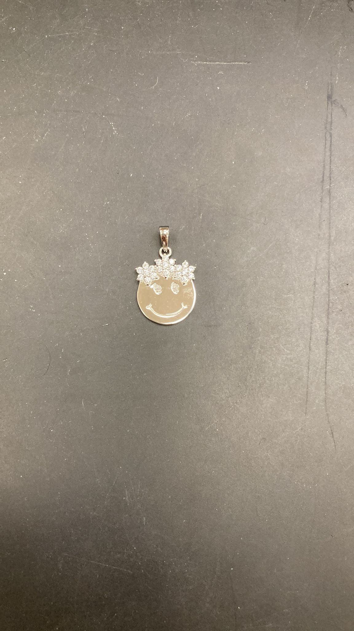 Sterling Silver Cz Crown Smiley Face Pendant PCZ6009, featuring a happy face design with sparkling crown detail.