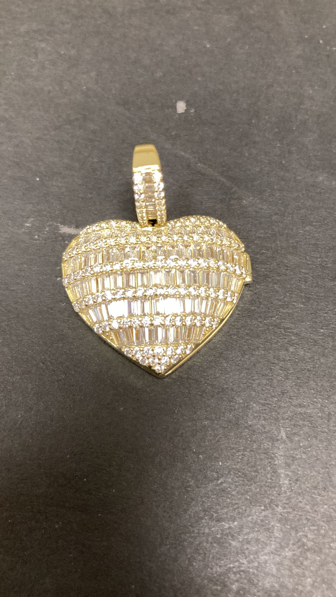 Heart shape sterling silver pendant PCZH113 with intricate design and shimmering details.