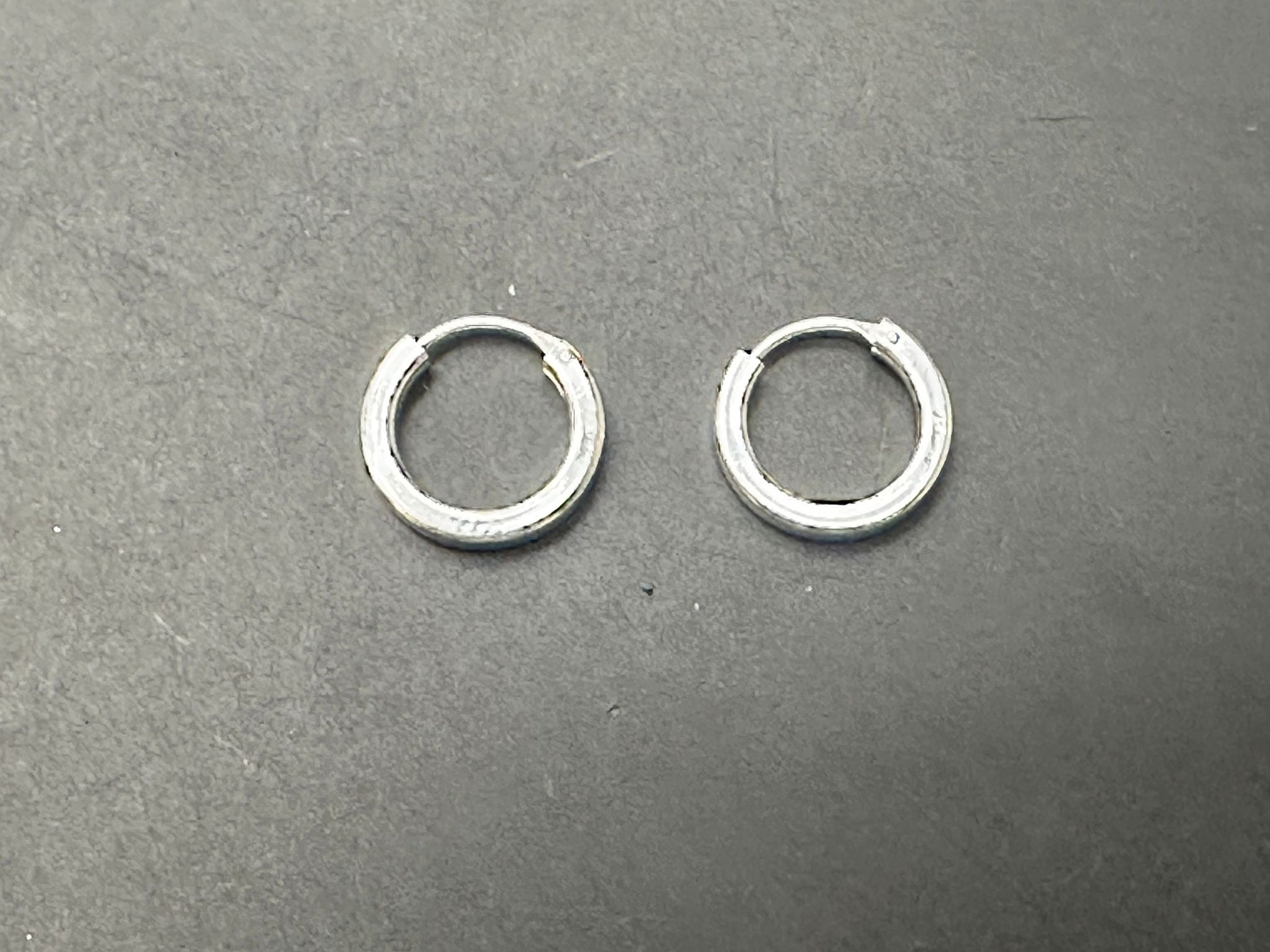 Sterling silver hoop earrings, plain square round design, perfect for everyday wear, shining finish, elegant style.