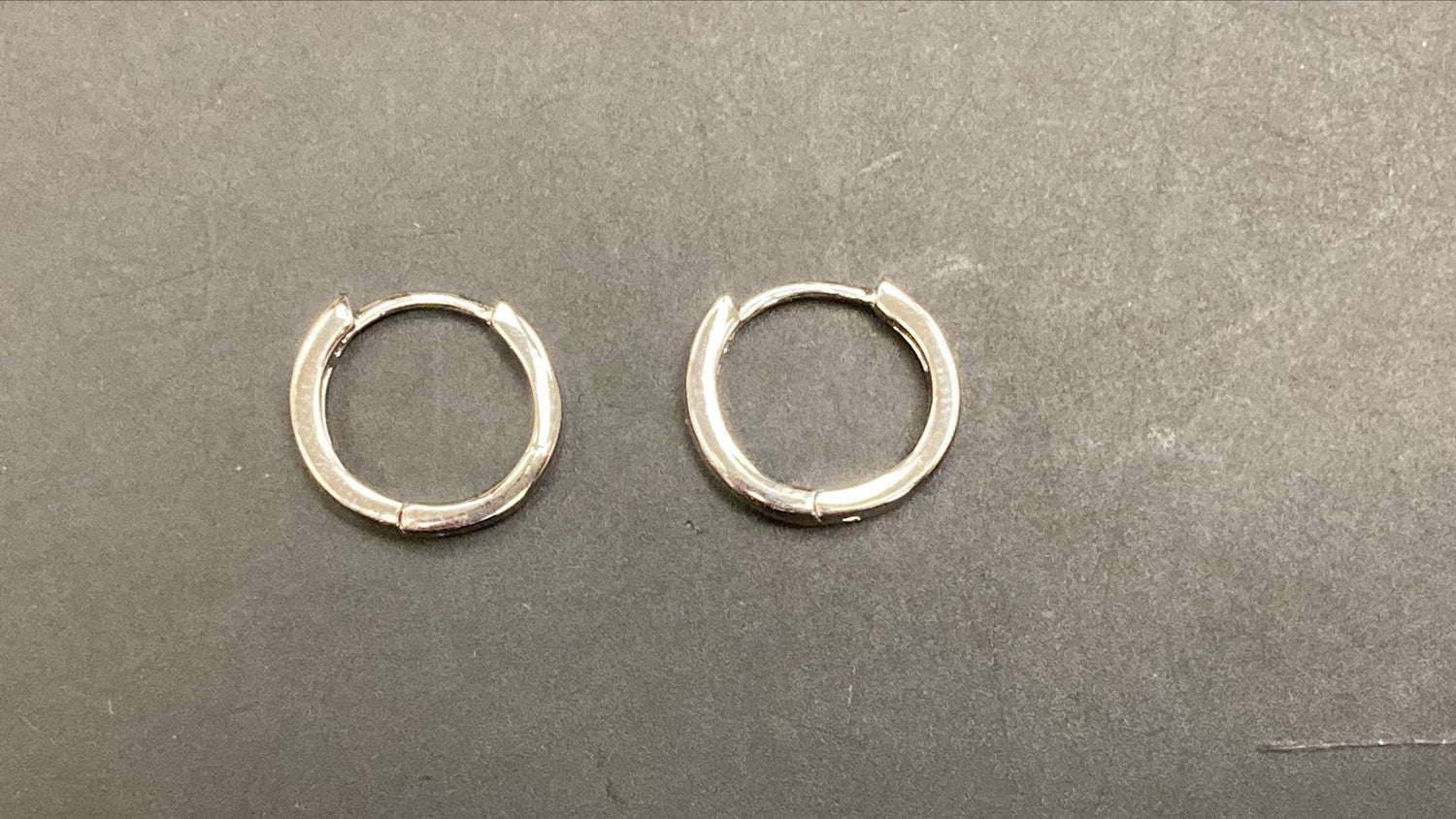 Sterling silver round earrings in a plain square design, showcasing a polished finish for elegant style.