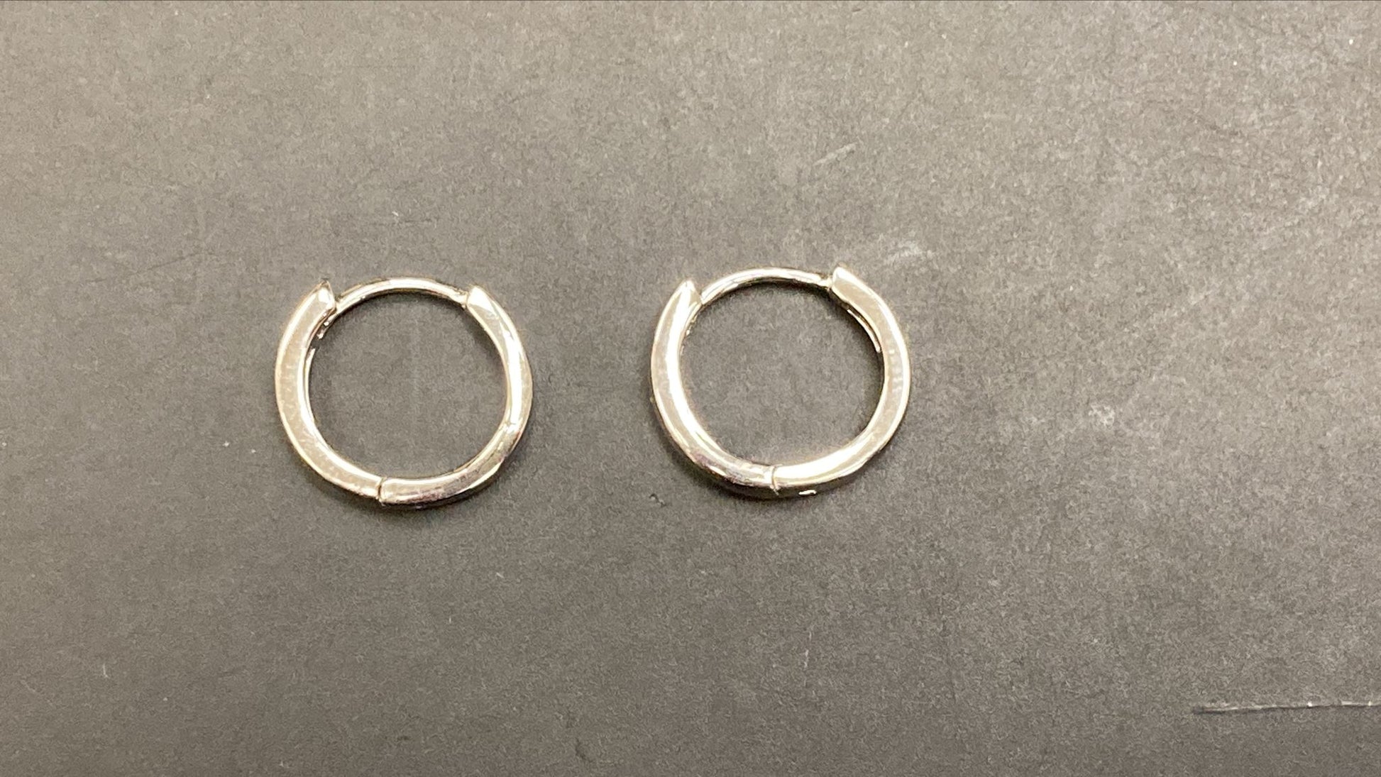 Sterling silver round earrings in a plain square design, showcasing a polished finish for elegant style.