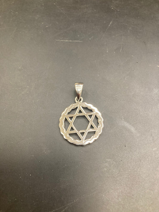 Sterling silver star of david pendant showcasing a delicate design and intricate details.