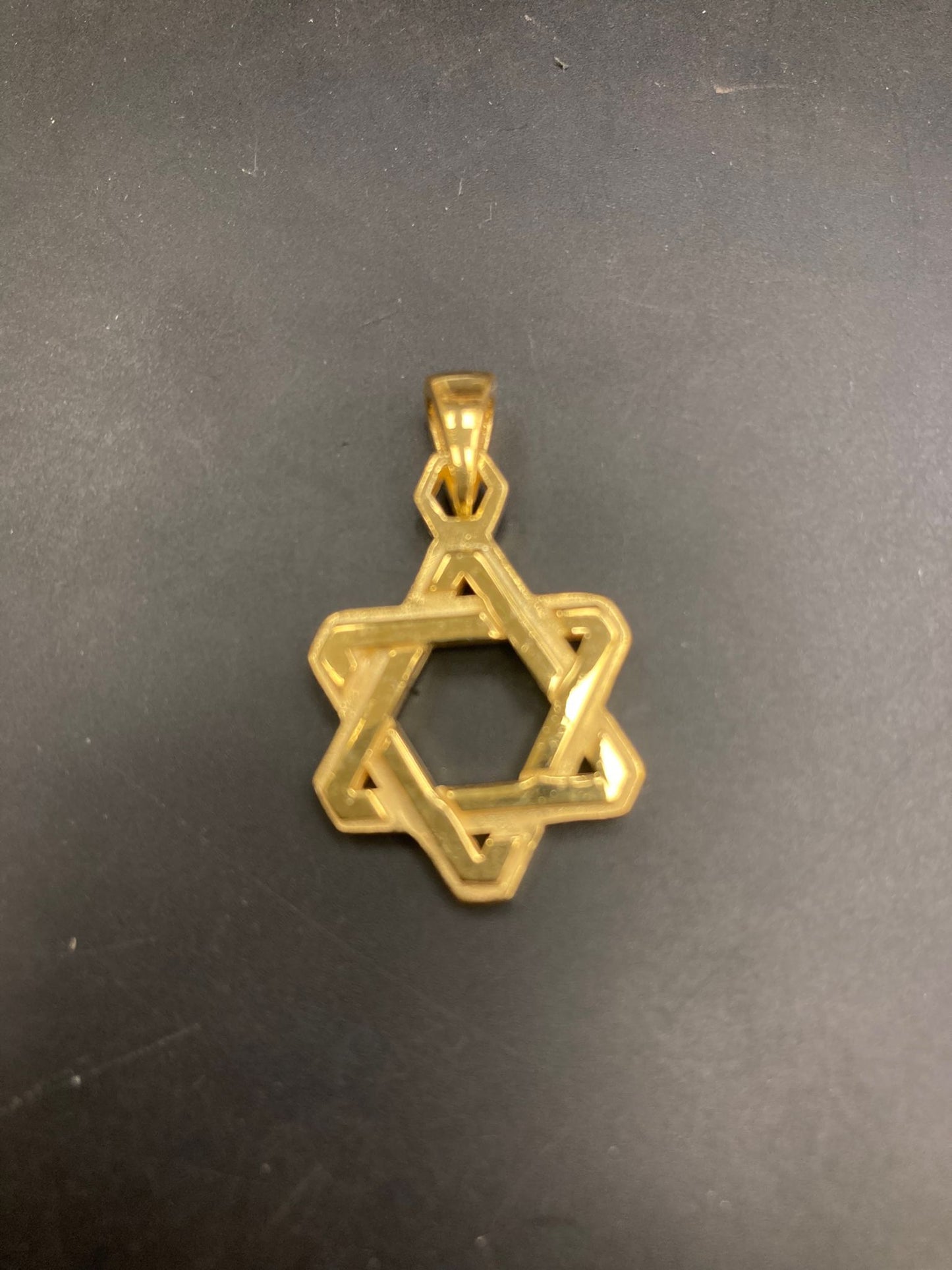 Sterling Silver Star of David Pendant - Elegant pendant featuring a traditional star design.