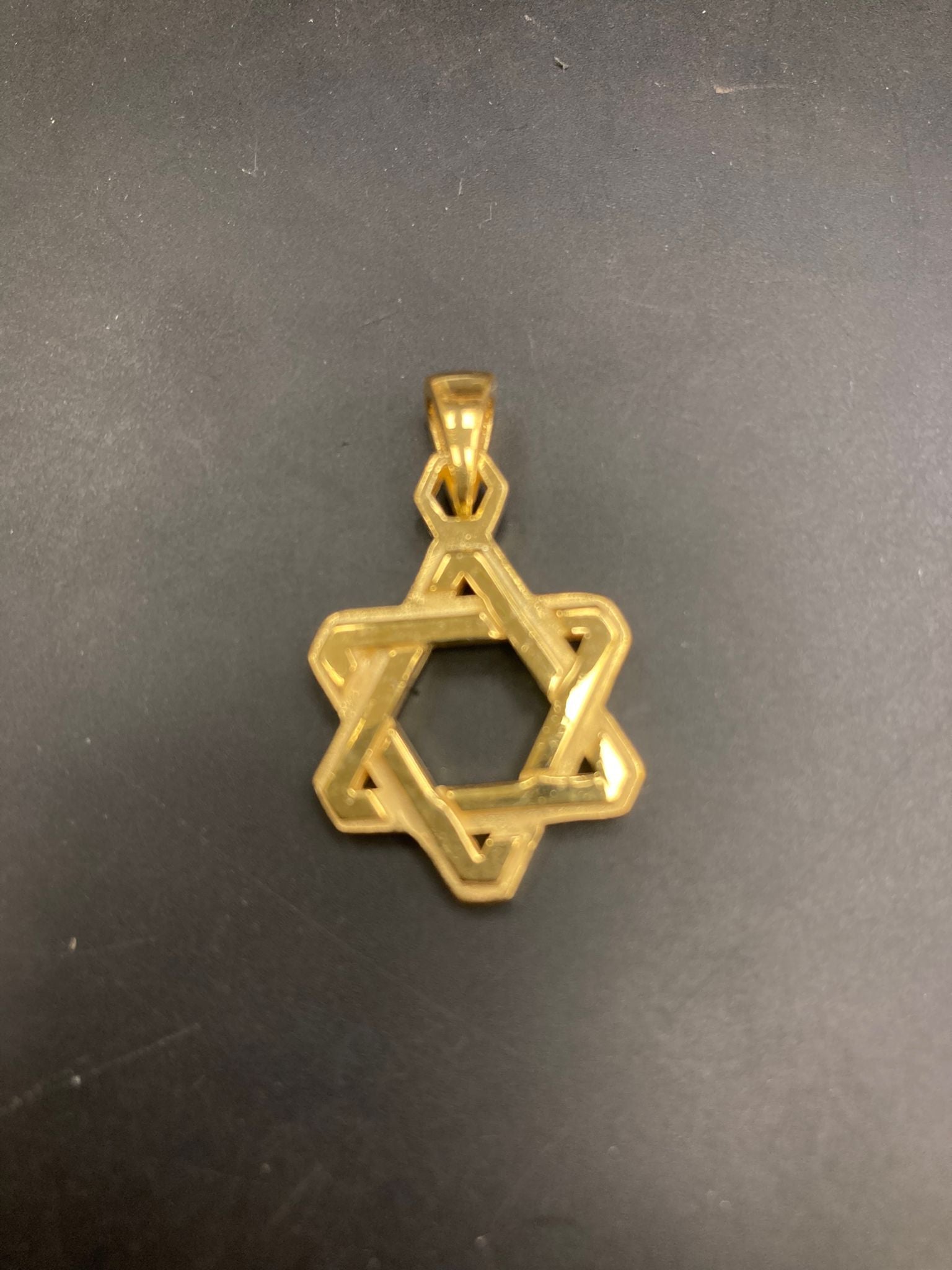 Sterling Silver Star of David Pendant - Elegant pendant featuring a traditional star design.