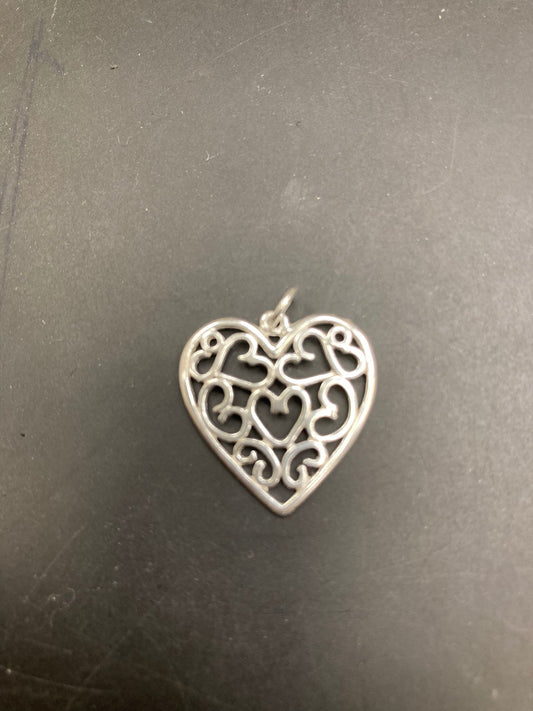 Sterling silver filigree heart pendant PP012 showcasing intricate heart designs and elegant craftsmanship.