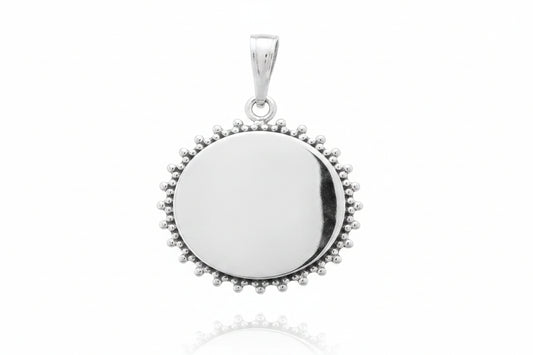 Sterling silver sun pendant with a shiny, plain surface and sunray design, 20 mm in size.