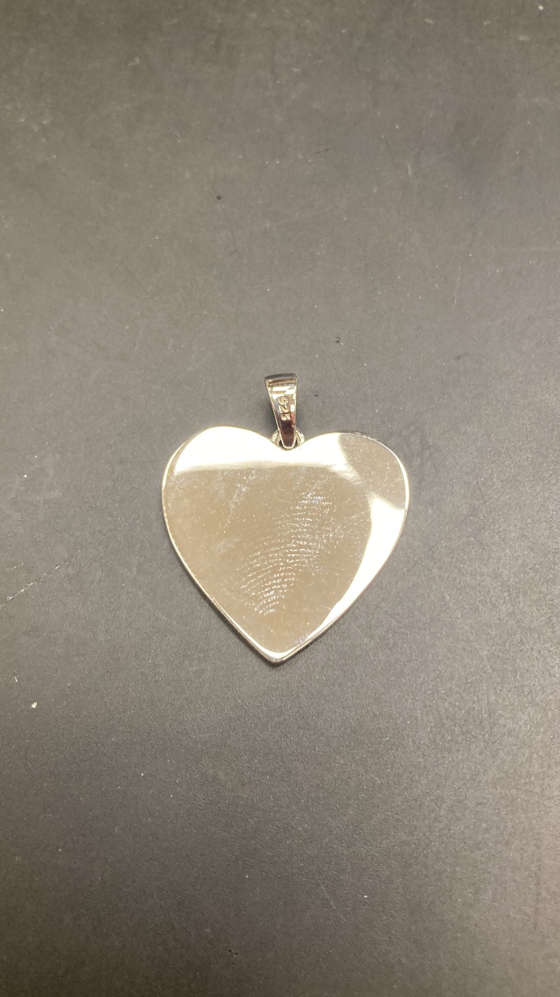 Sterling Silver Plain Heart Pendant PP100114, featuring a sleek sterling silver heart pendant design.