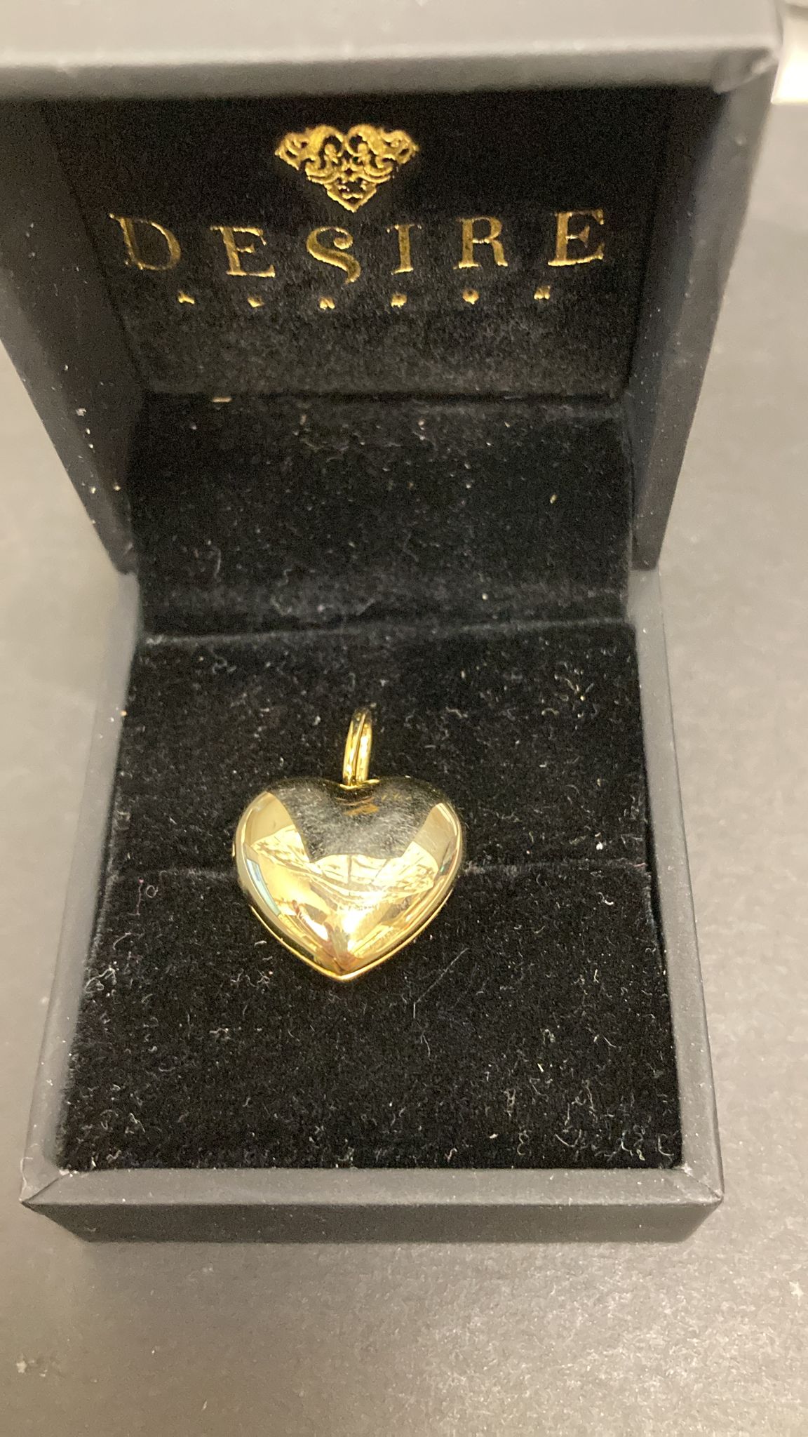 Sterling Silver Heart Shape Locked Pendant CZ Stone PP610 displayed in a jewelry box.
