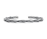 twisted sterling silver cuff bangle showcasing a sleek design, dimensions 5 x 45 x 65 mm.