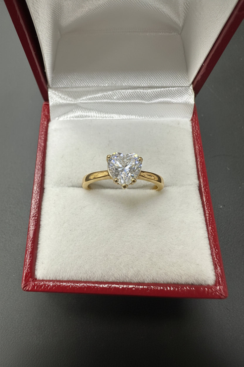 Sterling silver heart ring with cz stone featuring an 8x8mm center stone in a presentation box.