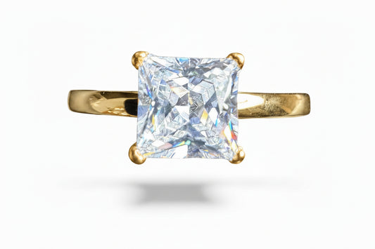 Princess cut sterling silver ring with 8mm CZ stone, gold plated design showcasing sparkling elegance.