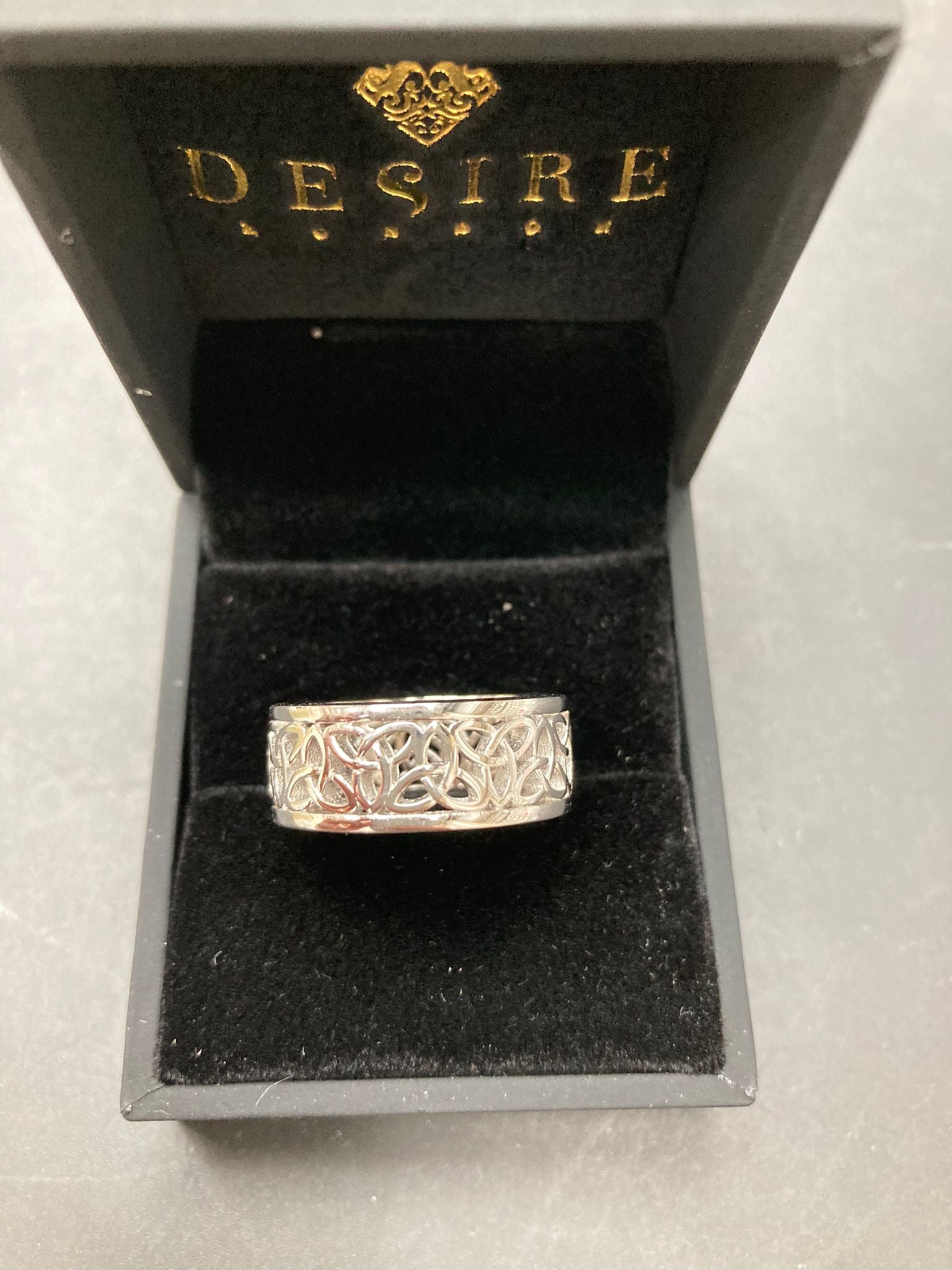 Sterling Silver Celtic Ring RP001 in a black box, showcasing a thick 8mm Celtic sterling silver ring 8mm design.