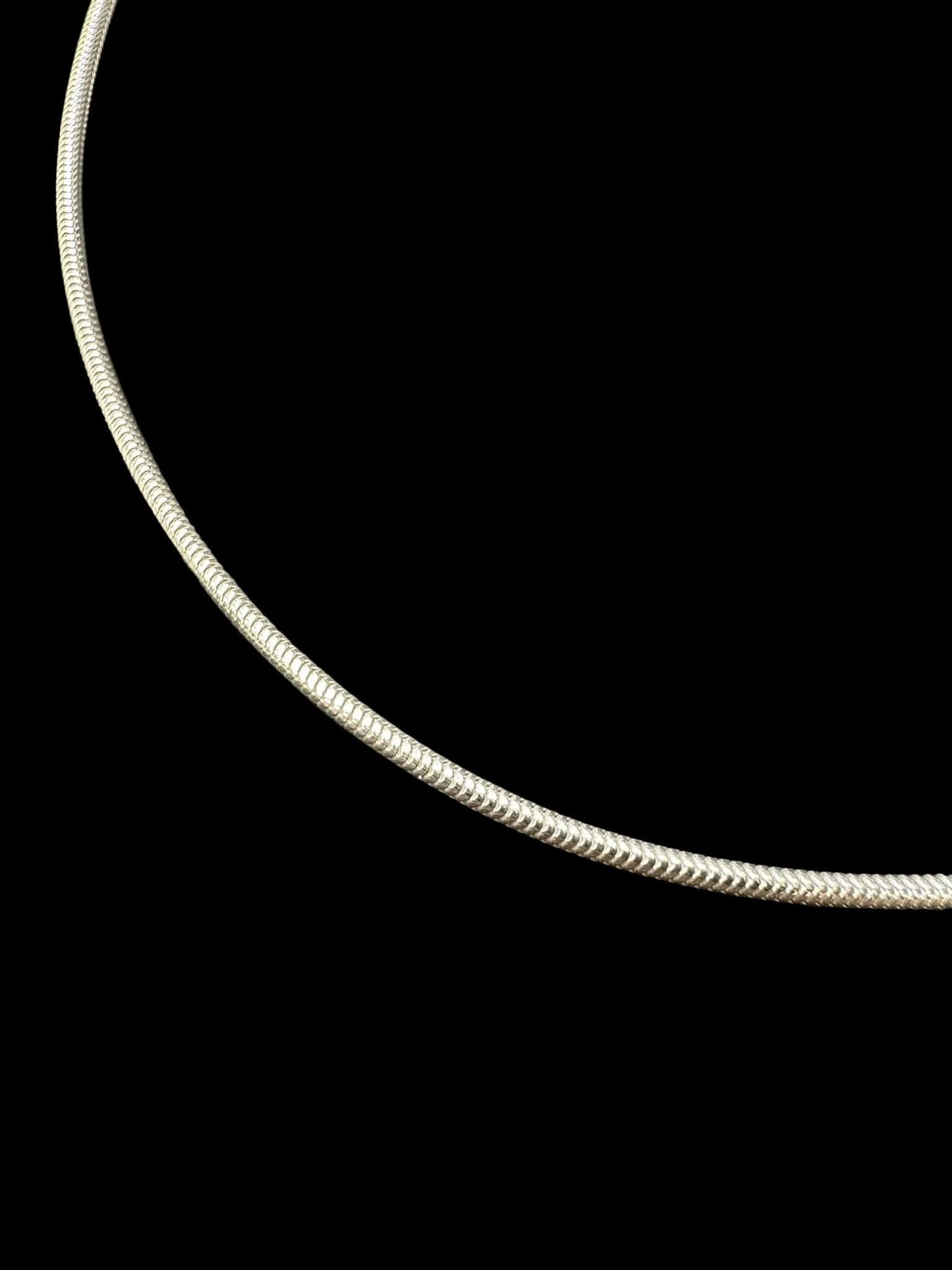 Sterling Silver 1.6 MM Snake Chain CHN3342 displayed against a black background.
