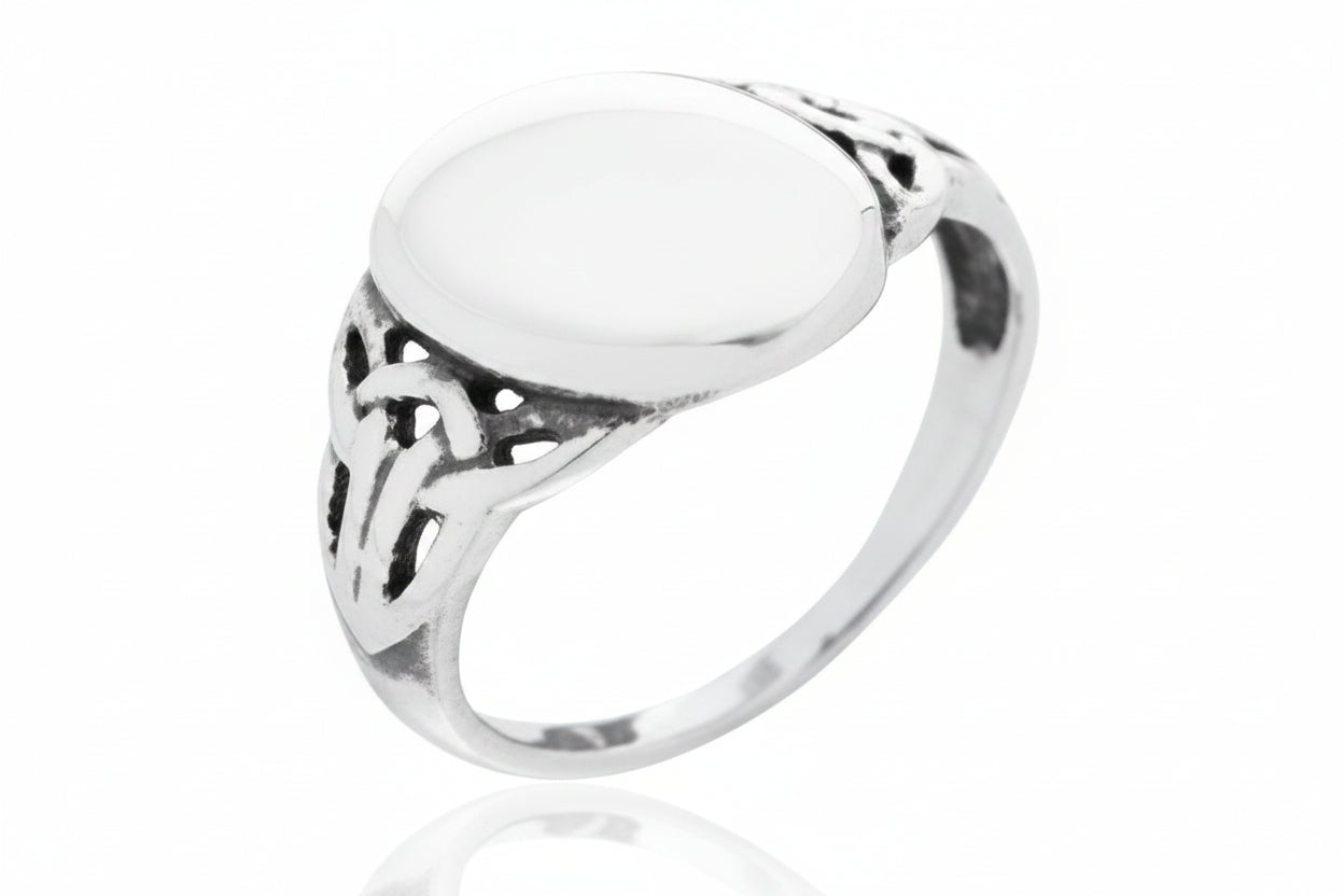 13mm sterling silver ring featuring an elegant design with a smooth, round surface and intricate detailing.