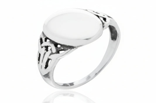 13mm sterling silver ring featuring an elegant design with a smooth, round surface and intricate detailing.