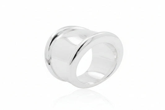 Plain sterling silver ring displayed from different angles, showcasing its elegant design and polished finish.