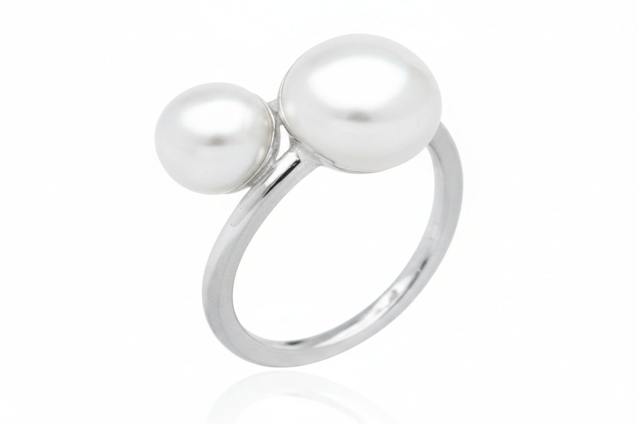 Sterling silver double ball ring featuring two elegant balls measuring 8 x 10 mm, perfect for stylish accessories.