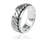 6mm sterling silver spinner ring with braided design, reflecting light elegantly.