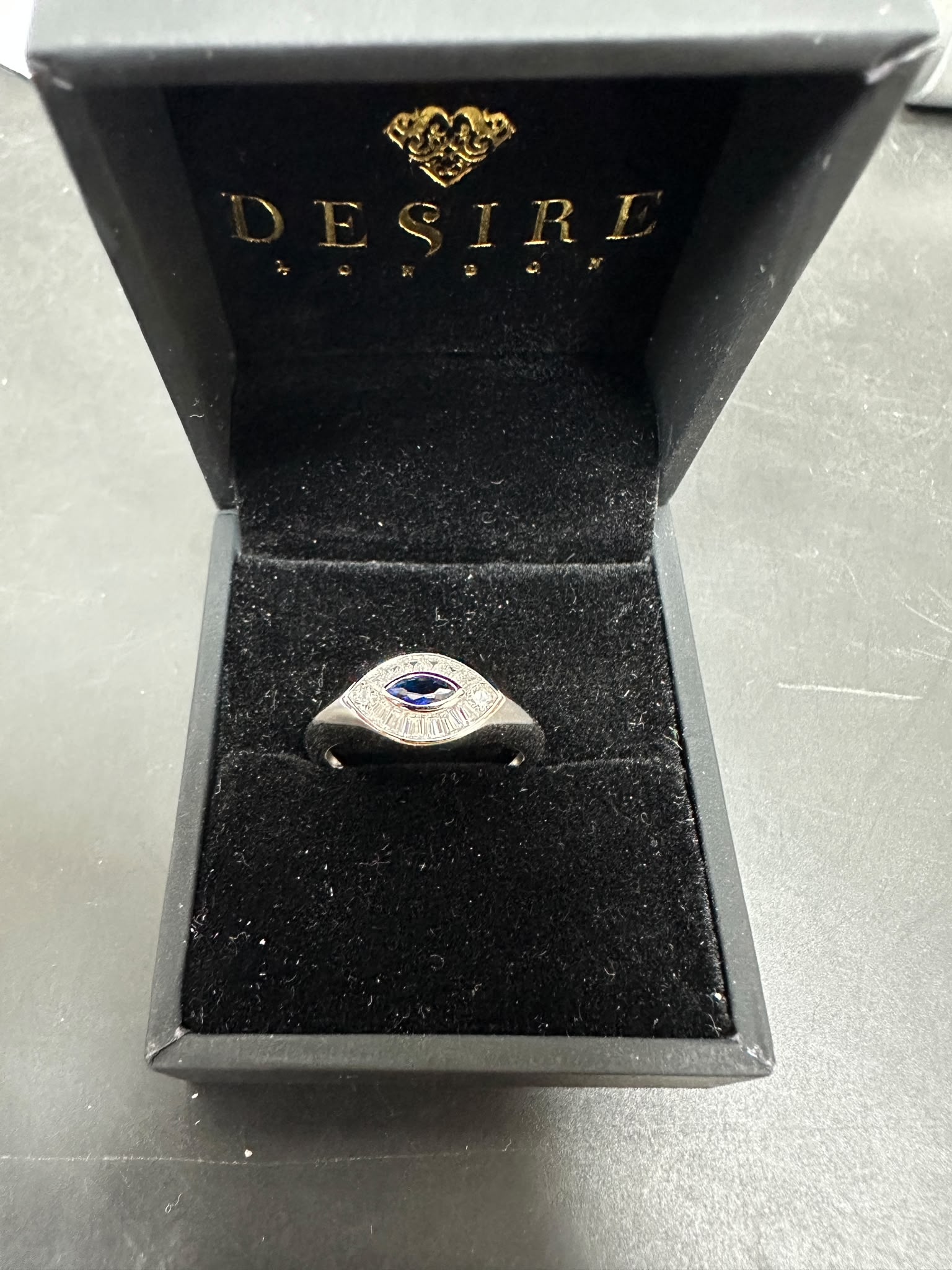 Sterling Silver Evil Eye Ring RCZ2988 displayed in a luxe black jewelry box for a stylish presentation.
