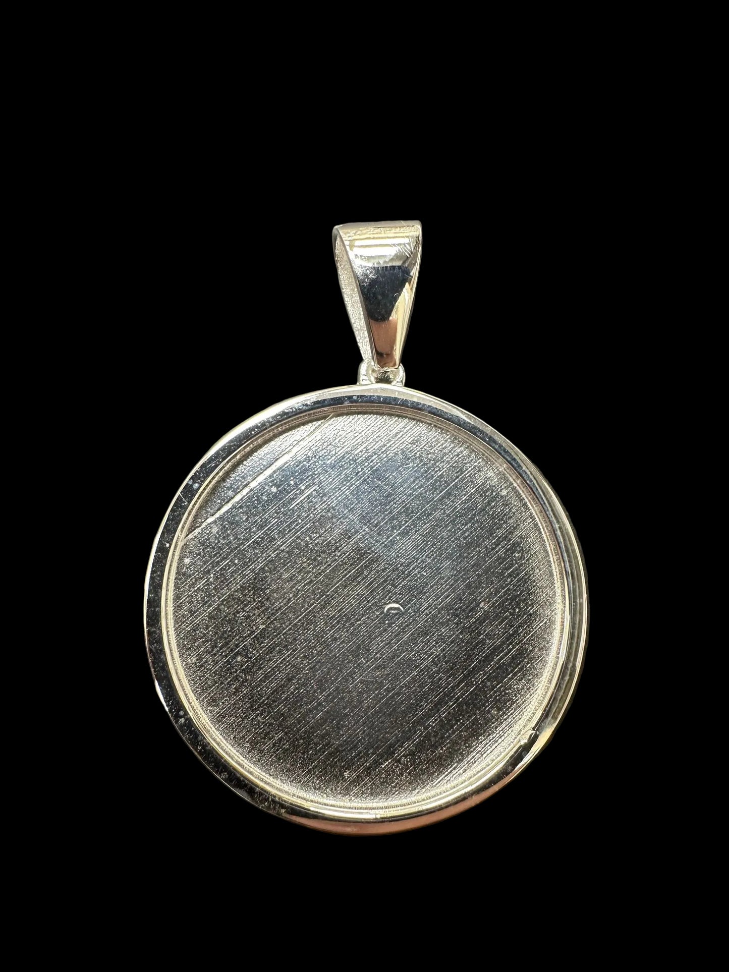 Plain sterling silver memory pendant featuring a smooth, polished surface and elegant design.