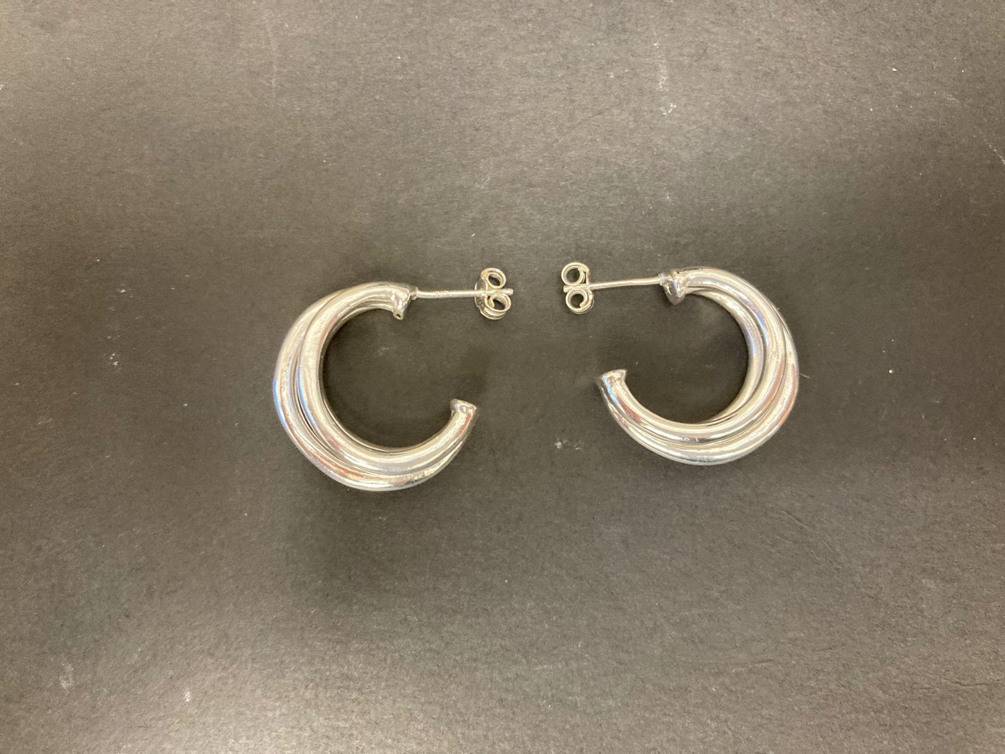 Sterling silver triple hoop earrings EP100119S displayed on a black background.
