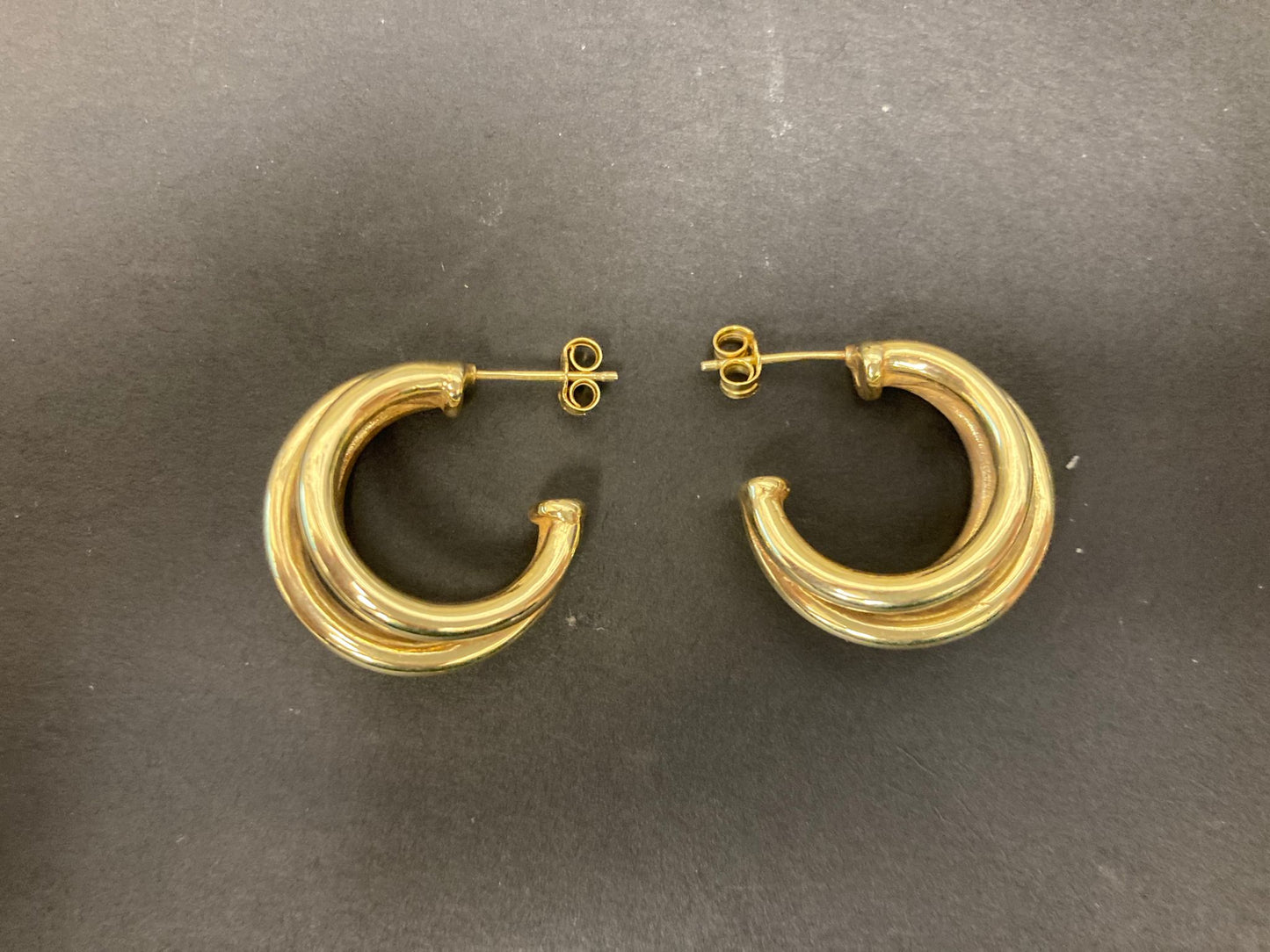 Sterling Silver Triple Hoop Earrings EP100119S showcasing elegant design and shine.