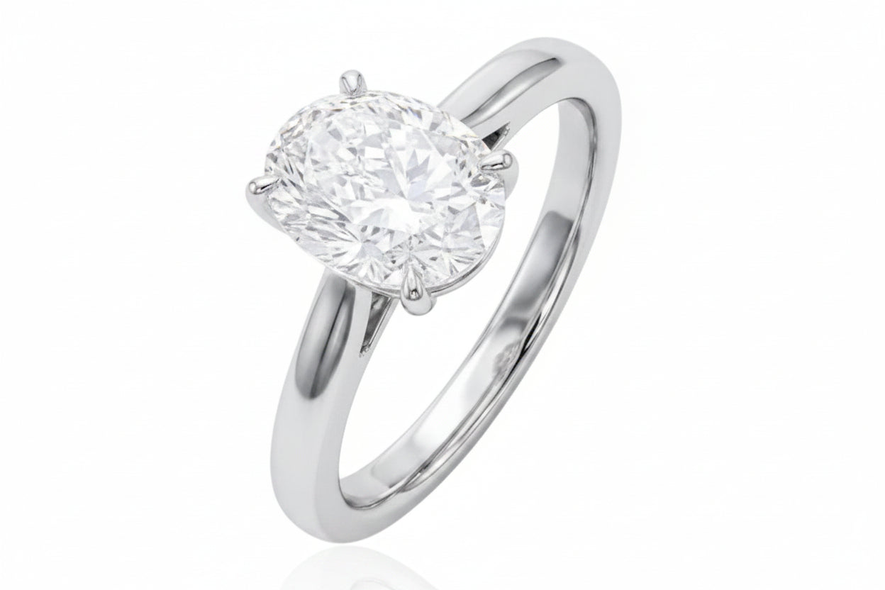 oval sterling silver ring with CZ stone featuring an exquisite 8x12 mm central stone, reflecting brilliance.